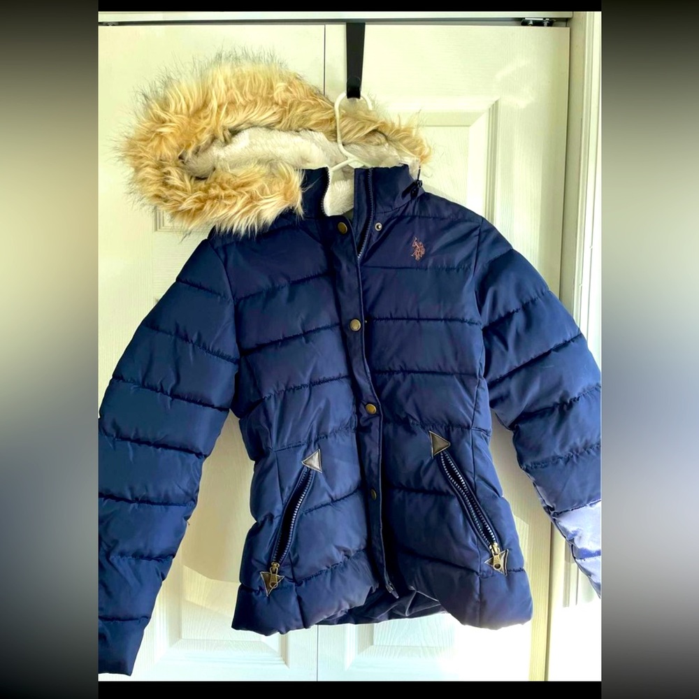 US. POLO. ASSN Navy blue woman’s winter coat, size small.